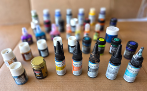 lot 539 image: Assorted acrylic paints, inks, and more as shown, assorted colors, 37 bottles