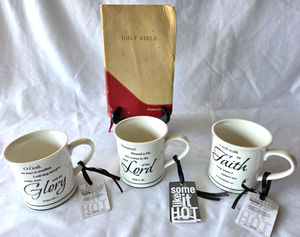 lot 549 image: NEW Faith based coffee mugs with store tags attached and Holy Bible