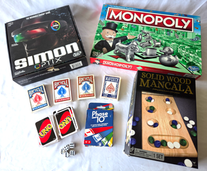 lot 569 image: Simon Optix, Monopoly, Solid Wood Mancala board games plus card games etc.