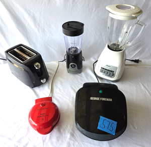 lot 575 image: countertop appliances, George Foreman grill, Oster blender, Kitchen Smith toaster, Nostalgia mini waffle maker, Bella Basics personal blender