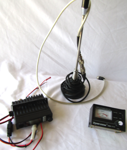 lot 605 image: Cobra CB radio model CCBR19UL61, plus antenna and Surecom SW-111 power meter