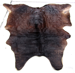 lot 588 image: Cowhide area rug, approximately 7ft x 7ft
