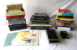 lot 600 image: Assorted books, motivational cassette tape sets, and cassette players