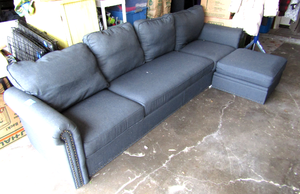 lot 586 image: Modern Modular couch and ottoman with internal storage compartment, completely and easily disassembles in minutes