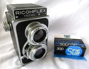 lot 608 image: Ricohflex Model IIII Twin-Lens Reflex (TLR) 120 Format Camera, includes two rolls of 120 Format Ilford and CineStill film