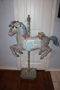 lot 7 image: Plastic carousel horse with wooden stand - 4 ft. tall