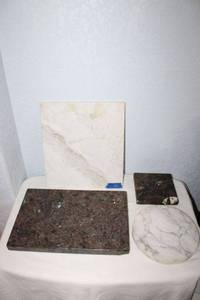 lot 66 image: Small granite cutting boards