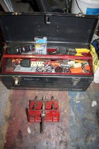 lot 77 image: Metal toolbox with tools and Sears Craftsman woodworking vise