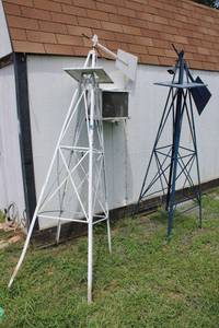 lot 96 image: White and blue metal windmills as shown