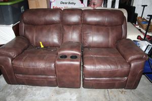 lot 117 image: Dual reclining brown leather sofa with cup holders and USB charging station
