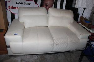 lot 121 image: White leather couch as shown (only 5 years old)