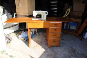 lot 129 image: Vintage sewing machine table with spool holder, JC Penney model Penncrest 3100