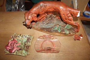 lot 168 image: Home dcor sculpted dog needs repairs