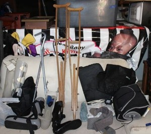 lot 172 image: Medical care items crutches, boots, heating pads