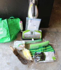 lot 176 image: Bissell Crosswave floor cleaner and Misc. cleaning items
