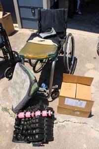 lot 203 image: Wheelchair with new tires in box