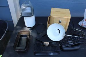 lot 218 image: Misc. lot suggestion box, desk lamp, air popper, purses