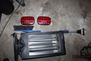 lot 229 image: Oscillating heater, snow scraper, and magnetic vehicle red lights