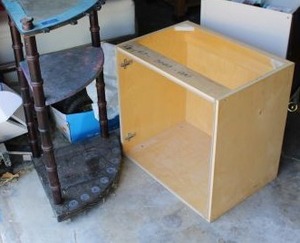 lot 232 image: Homemade fishing pole holder and wood cabinet