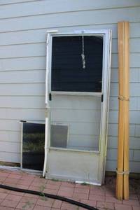 lot 238 image: Screen door and wood trimming