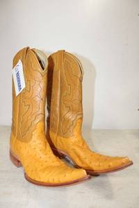 lot 455 image: Herrera golden butter and light brown color ostrich boots size 7.5