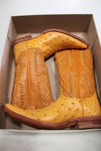 lot 521 image: Herrera golden butter and brown color ostrich boots size 7