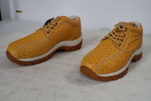 lot 547 image: Red Diamond light brownbuttercup color tennis shoes size 9.5