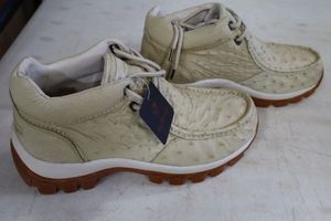 lot 559 image: Red Diamond bone color tennis shoes size 9