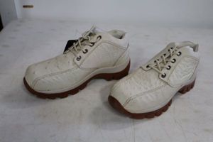 lot 560 image: Red Diamond bone color tennis shoes size 9.5