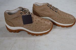 lot 563 image: Red Diamond taupe color tennis shoes size 7.5