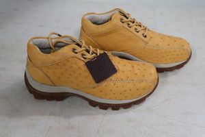 lot 568 image: Red Diamond light brownbuttercup color tennis shoes size 10