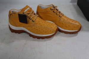 lot 571 image: Red Diamond light brownbuttercup color tennis shoes size 8