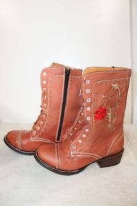lot 727 image: Kids brown lace up boots with embroidered red (not sure size)