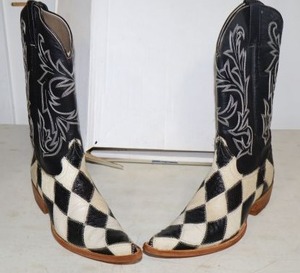lot 108 image: Herrera black and white color ostrich boots, size 6
