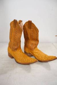 lot 176 image: Herrera Ostrich buttercup and brown color boots size 8.5