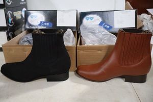 lot 1059 image: Two pairs of short boots size 7.5 in brown and black colors (2 times the money)