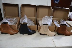 lot 1061 image: Four pairs of short boots size 7.5 in brown, bone, and black colors (4 times the money)