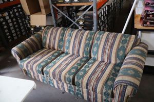 lot 1092 image: Sleeper sofa, mesa fabric style, plastic still on mattress