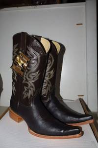 lot 774 image: Old Creek chocolate color boots with pointed toe, size 9