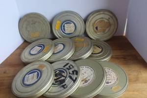 lot 11 image: lot of vintage 16mm metal film and film canisters