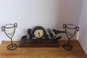 lot 13 image: vintage bird mantel clock features decorative scrolling vine work and a prominent bird figurine & wrought iron candle holder features a scroll design and two glass droplet cups