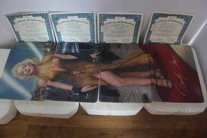 a Bradford Exchange Marilyn Monroe "Hollywood Venus" 4-piece plate set by artist Keith Birdsong all plates come with their authenticity papers