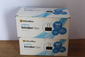 lot 28 image: OfficeMax brand medium binder clips. And Each box contains 144 individual black clips.