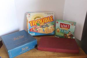 lot 32 image: vintage and classic board games like Trouble & Trivial Pursuit &  What Should I Do & more see pictures for details