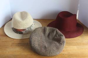 lot 43 image: collection features a Stetson Emin straw fedora alongside a brown felt hat and a herringbone flat cap