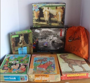 lot 49 image: Collection of puzzles and more see pictures for details