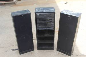 lot 69 image: RCA RP-9115 compact audio system featuring a CD player, radio tuner, and dual cassette decks