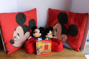 lot 83 image: Mickey Mouse plush throw pillows & vintage Carousel by Guy Disney Mickey Mouse slippers.and more see pictures for details