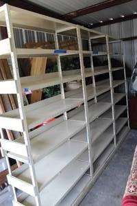 lot 85 image: Large metal shelf reinforced with wood to hold them all together this one is about 9 feet long by 75 inches tall (Bring Help loading this one)