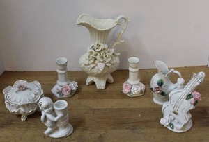 lot 91 image: vintage Italian porcelain figurines, potentially in the Capodimonte style, featuring cherubs (putti) and applied floral details and more see pictures for details
